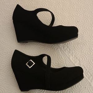 Black faux suede wedge heels